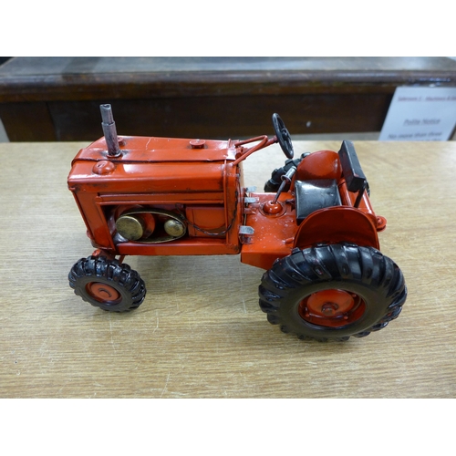 2128 - A tinplate tractor ornament