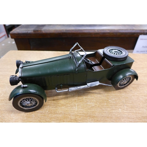 2129 - A tinplate car ornament