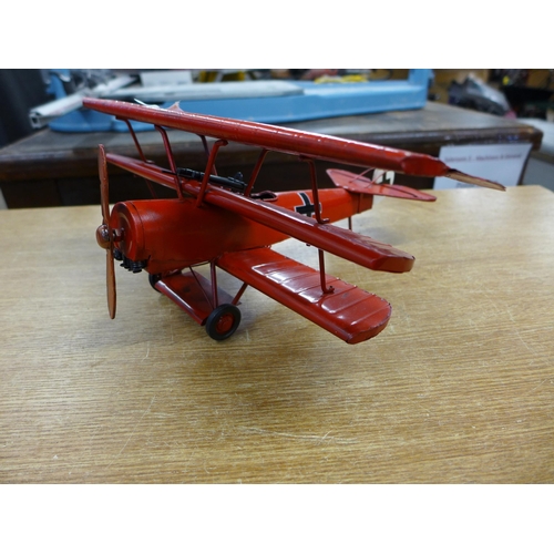 2135 - A tinplate aeroplane ornament