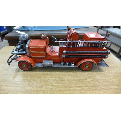 2136 - A tinplate fire engine ornament