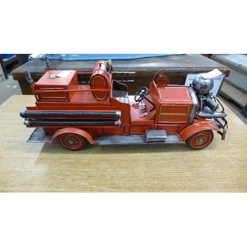 2136 - A tinplate fire engine ornament