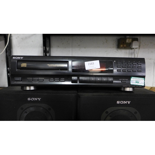 2163 - A Sony CDP-M302 compact disc player and two Sony SS-A70E speakers