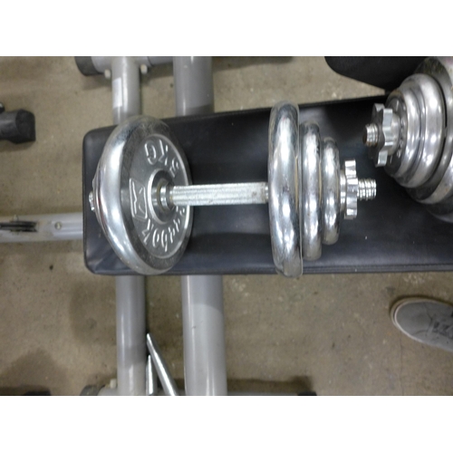 2190 - A weight-bench and metal weights with instructions