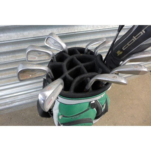 2208 - A Kasco Golf trolley bag with a full set of Mizuno Faldo irons (3-SW), Cobra S2 3 wood and a Ping Ey... 