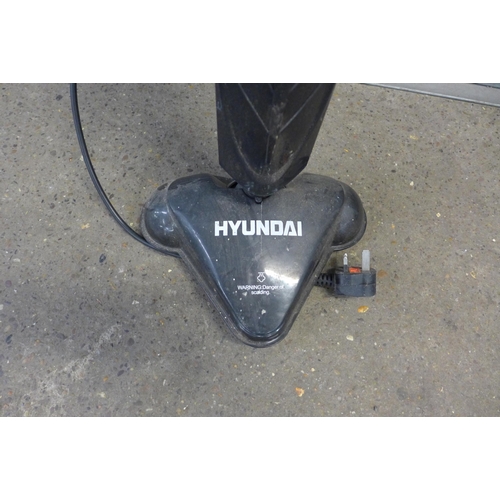 2210 - A Hyundai steam cleaner and a bbq