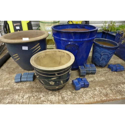 2221 - Four blue planters with feet