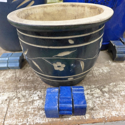 2221 - Four blue planters with feet