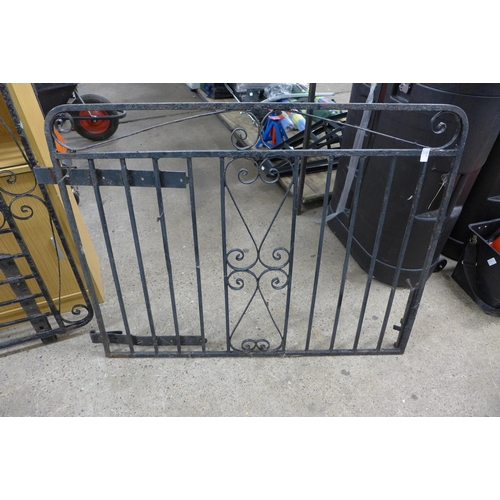 2247 - A pair of wrought iron driveway gates