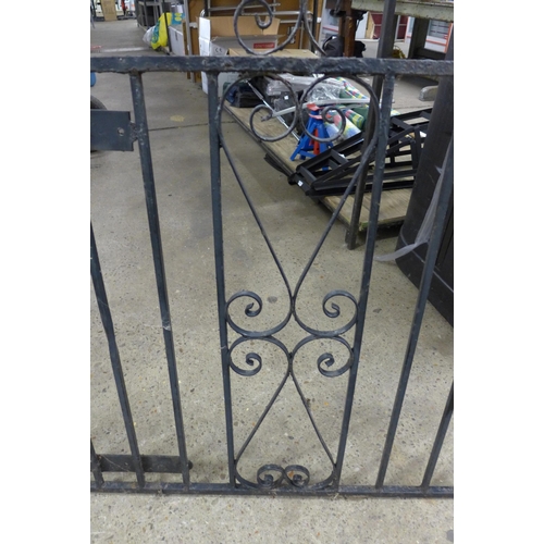 2247 - A pair of wrought iron driveway gates