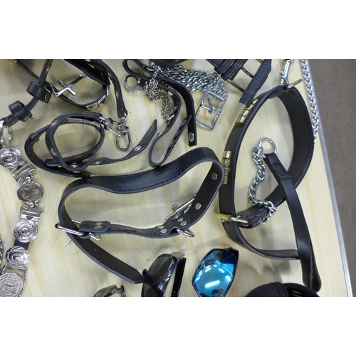 2253 - A box of leather belts, bags and sunglasses