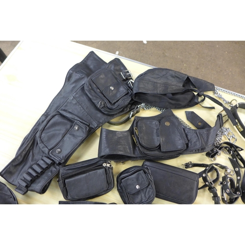 2253 - A box of leather belts, bags and sunglasses