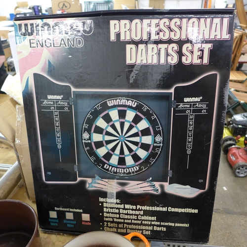 2265 - A Winmau professional dart board- in box