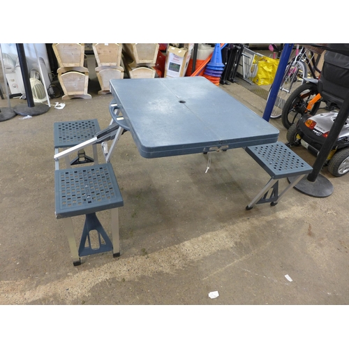 2280 - A children's table and chairs and fold-out bench