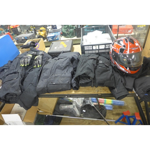 2337 - A box of motorbike clothing and helmet