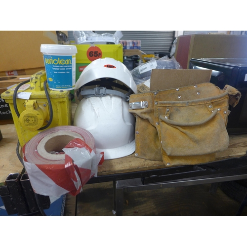 2358 - A 110V transformer, 2 hard hats, tool belt, safety tape and tubs of Puriclean