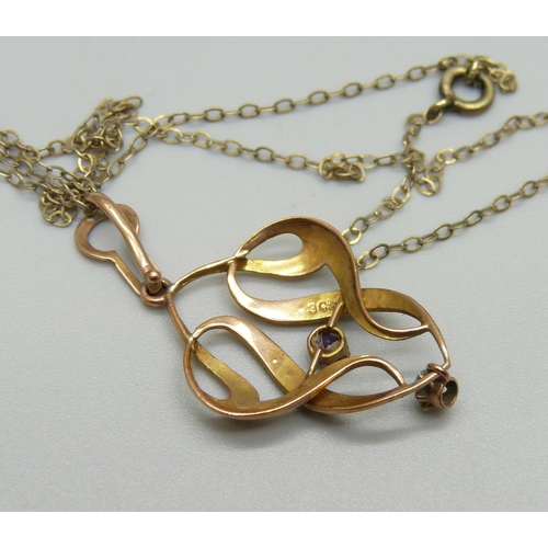 1003 - A 9ct gold Art Nouveau pendant