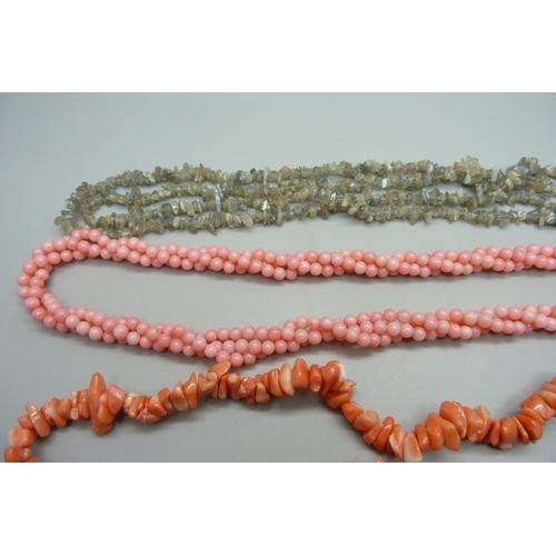 1010 - Three semi precious stone necklaces, coral and labradorite