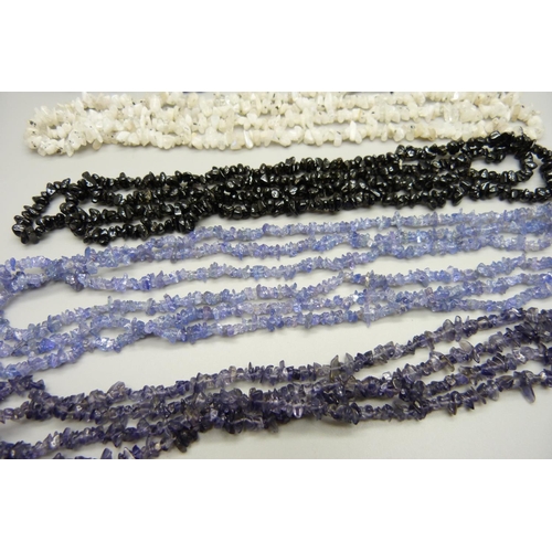 1011 - Five semi-precious stone necklaces including black agate, moonstone, black spinel and tanzanite