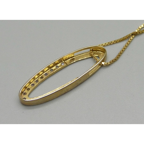 1026 - A 9ct gold and diamond pendant on a 9ct gold chain, 3.3g