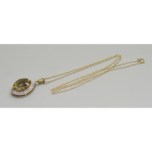 1027 - A 9ct gold and stone set pendant on a 14ct gold chain, 4.5g