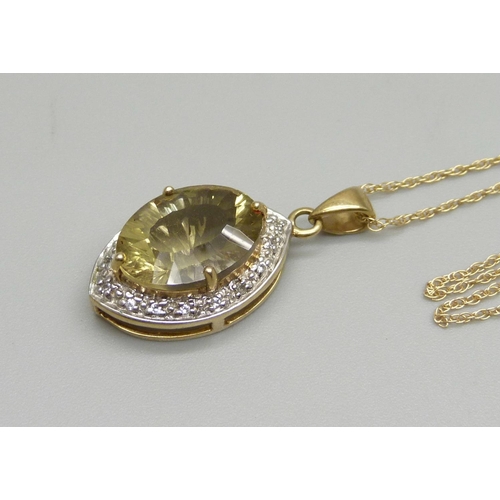 1027 - A 9ct gold and stone set pendant on a 14ct gold chain, 4.5g