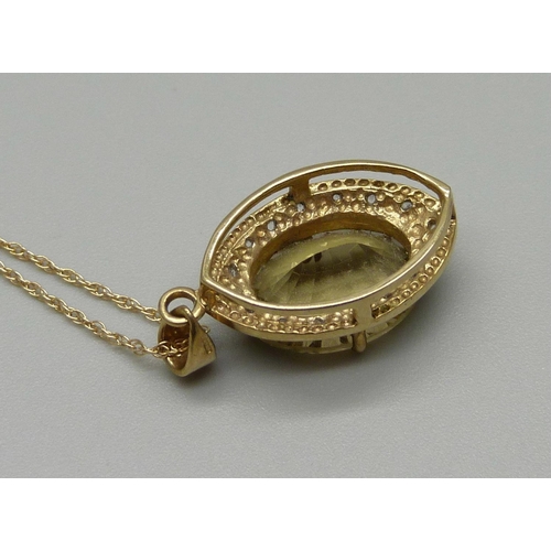 1027 - A 9ct gold and stone set pendant on a 14ct gold chain, 4.5g