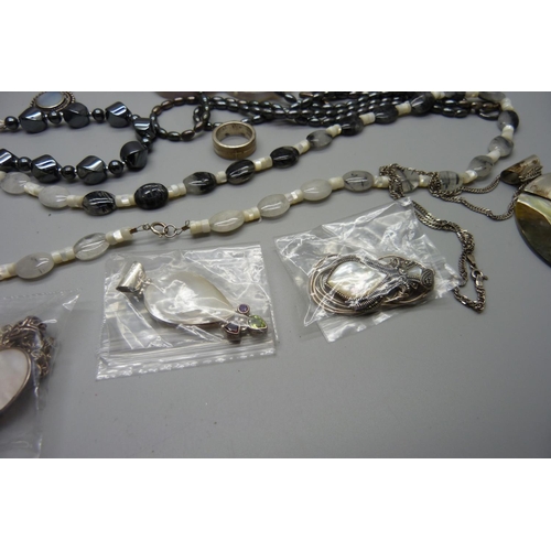 1030 - A collection of silver and other jewellery, some set with mother of pearl