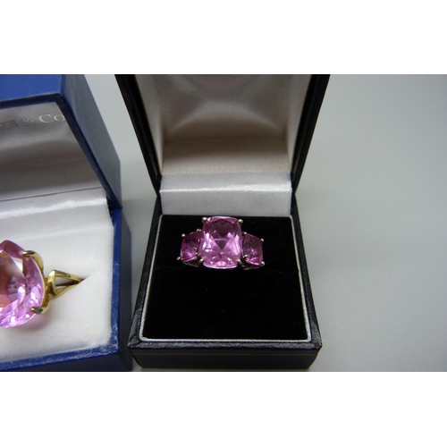 1052 - Two silver and pink stone set rings, N and P