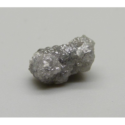 1059 - A rough/uncut diamond, weight 2.38cts