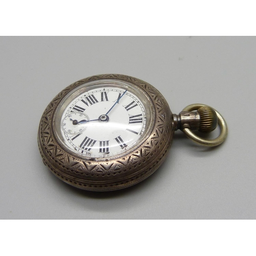 1065 - A silver cased fob watch in leather case/strap