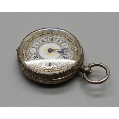 1066 - A silver cased fob watch in leather case/strap