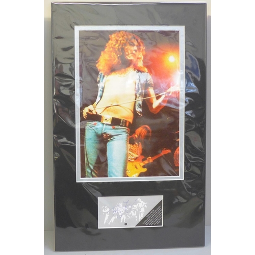 604 - A Led Zeppelin autographed display; Robert Plant