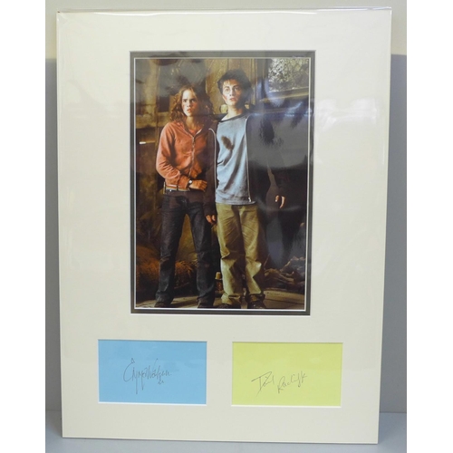 609 - A Harry Potter autograph display; Daniel Ratcliffe and Emma Watson