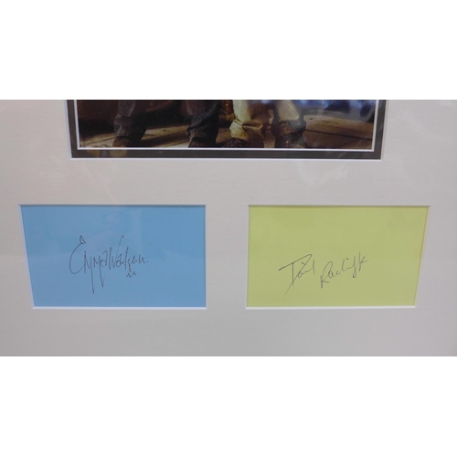 609 - A Harry Potter autograph display; Daniel Ratcliffe and Emma Watson