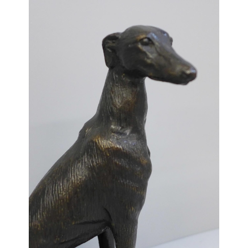 623 - A bronze figure of a greyhound on marble base, 19cm