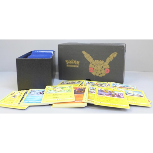 634 - 350 Black Star rare Pokemon cards, different years and sets in collectors box with dice, etc.