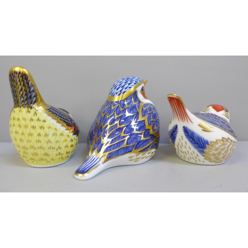 655 - Three Royal Crown Derby paperweights; Robin, Goldcrest and Blue Tit, all with gold stoppers