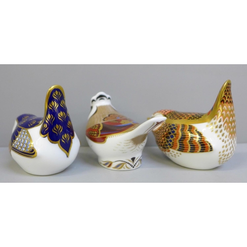 660 - Three Royal Crown Derby paperweights; Crested Tit, Derby Wren and Wren, all with gold stoppers