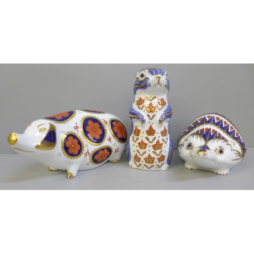 663 - Three Royal Crown Derby paperweights; Hedgehog, Old Spot Pig and Chipmunk