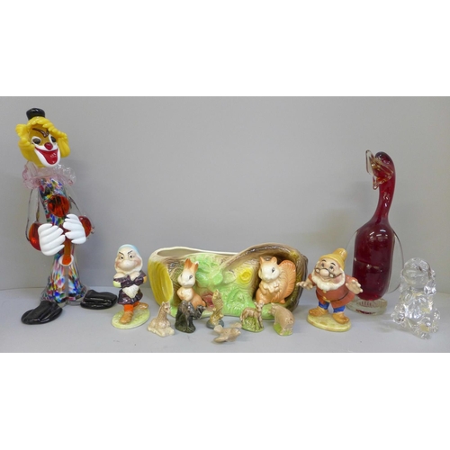 670 - A Murano glass clown, a glass model of a duck and dog, two Beswick seven dwarfs figures, Grumpy and ... 