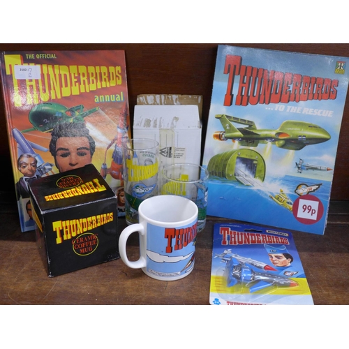 676 - Thunderbirds; annual, albums 1-6, book of Technical Data, model Thunderbird 1,2,3 and 4, coffee mug,... 