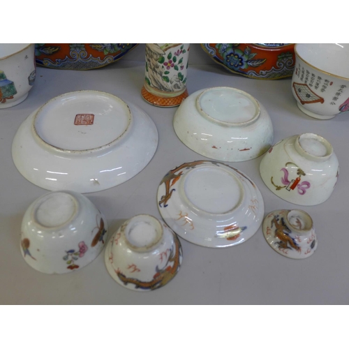 681 - A collection of oriental china including a hand painted vase, small chip to rim, famille rose bowls,... 