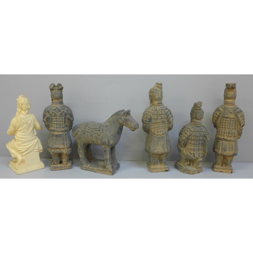 688 - Four Chinese models of terracotta warriors, horse and a resin figure of Moses