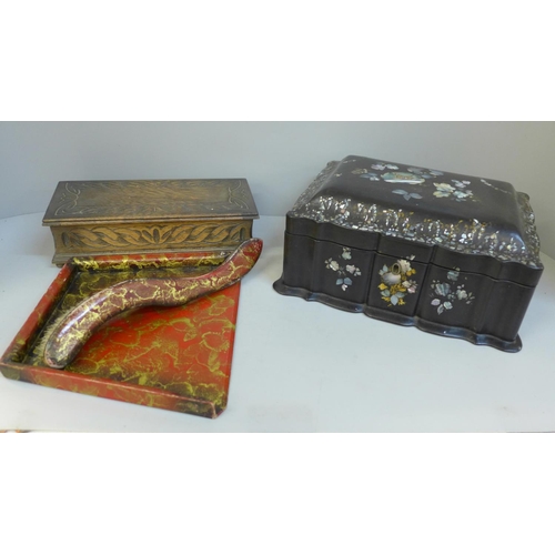 690 - An abalone decorated dressing table box, a carved wooden musical box and a crumb tray and brush