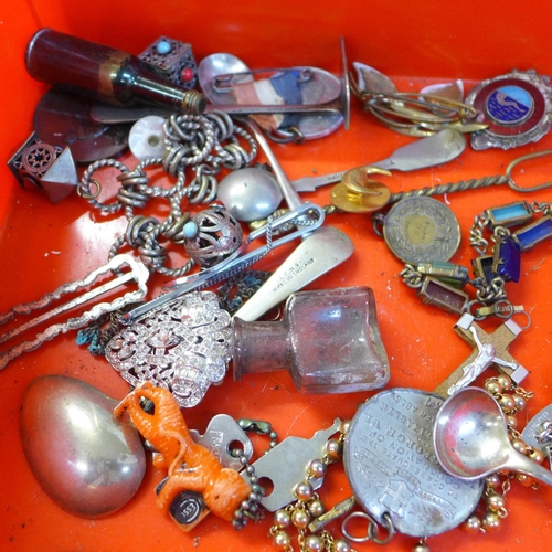 702 - Assorted items including a hair brush, spoon, bangle, letter openers, football medal, etc.