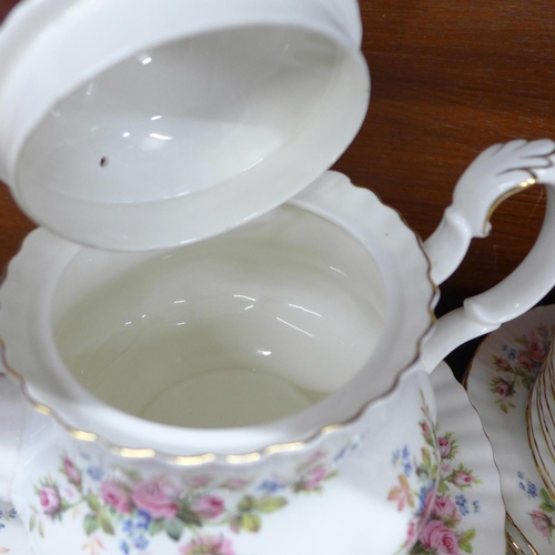 709 - A Royal Albert Moss Rose six setting tea and dinner service, eight setting, 49 pieces in total **PLE... 