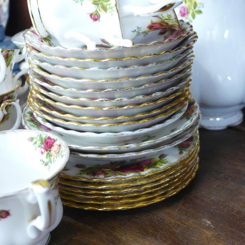 716 - A Royal Albert Old Country Roses part coffee set, eleven cups, twelve saucers, six tea plates, coffe... 