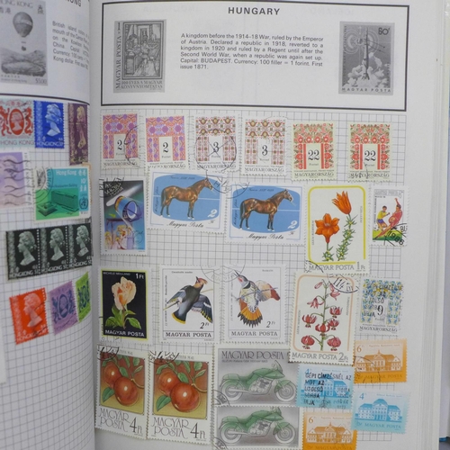 718 - Three stamp albums