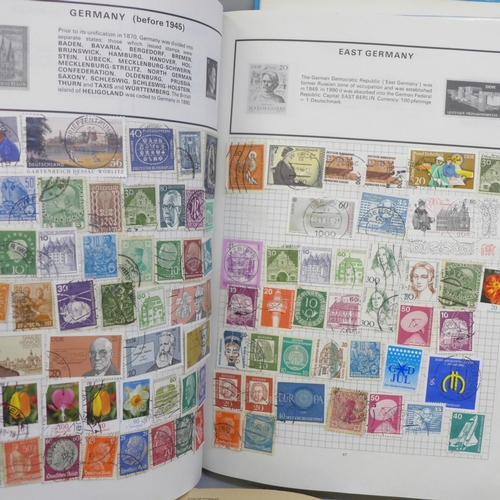 718 - Three stamp albums