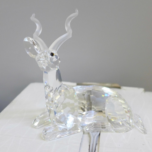 721 - A Swarovski elephant, stag and seals, boxed